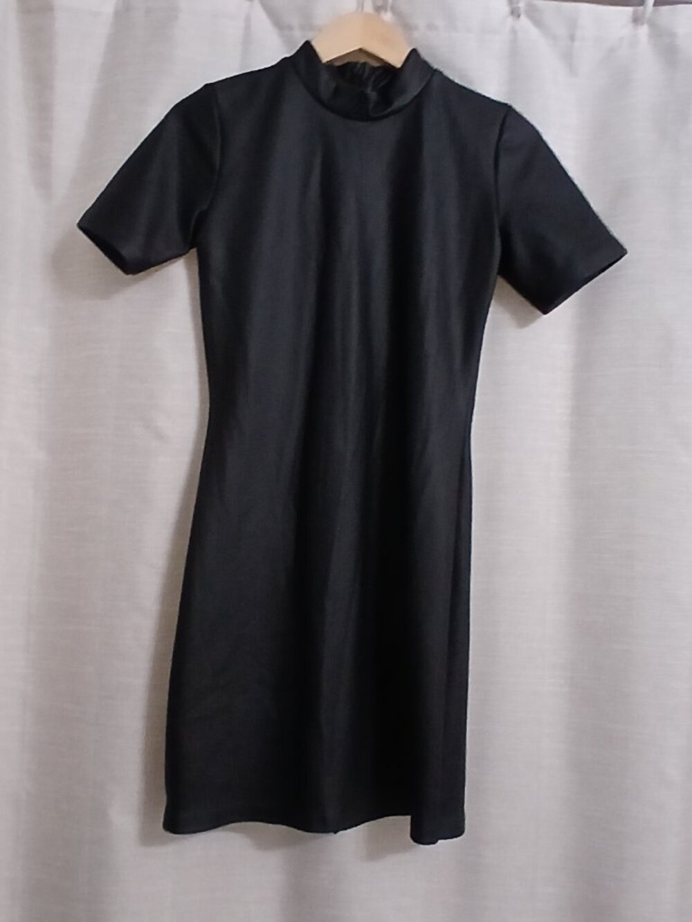 a Black faux leather dress